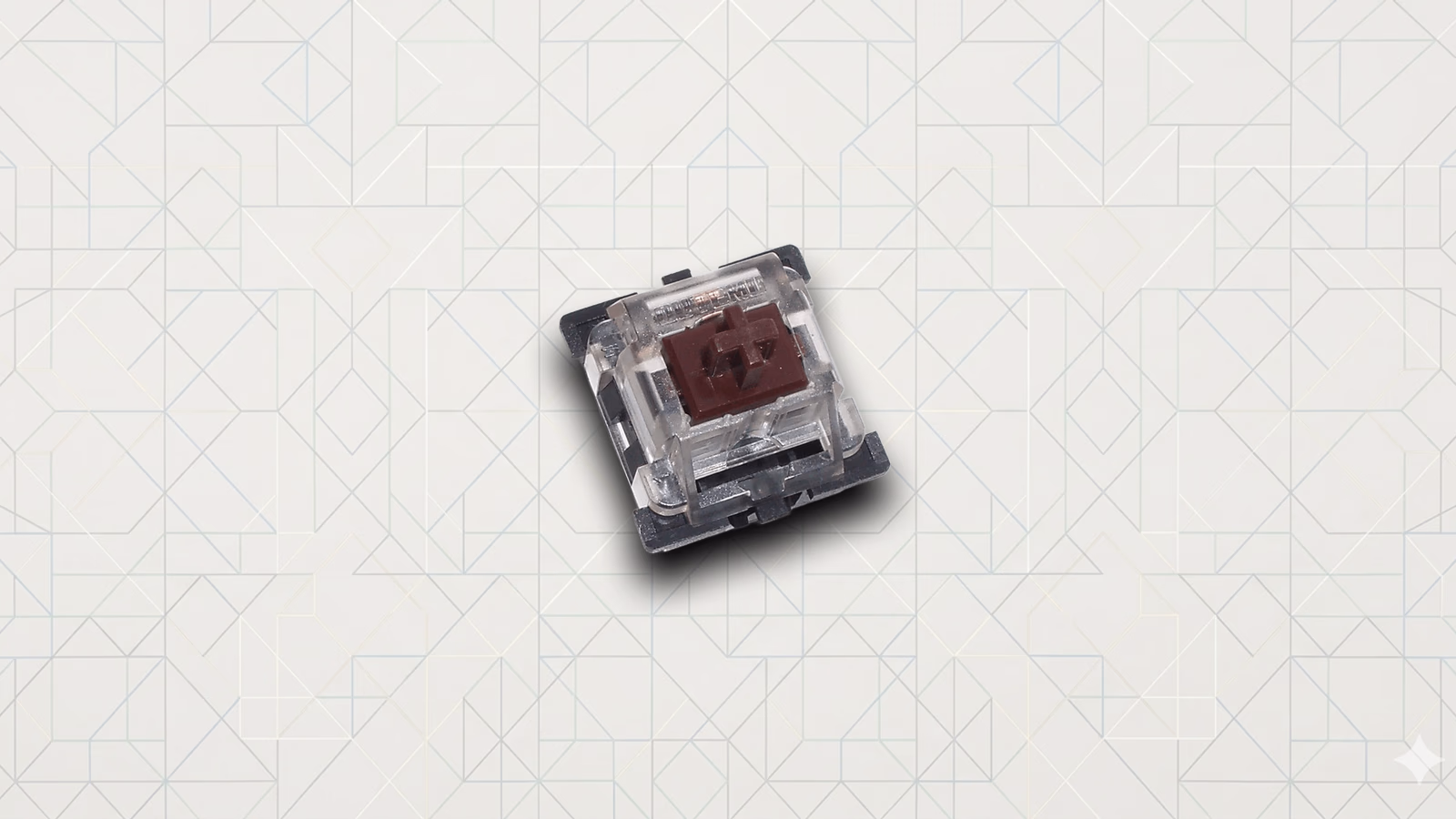 A single brown-stem tactile mechanical keyboard switch on The Setup Loft signature background, the family the guide recommends for most coders.